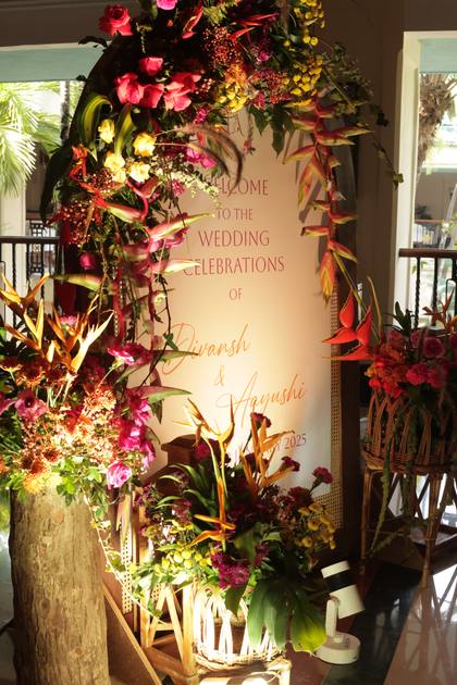 Signage and Floral detail — Arrival / Lobby decor — Taj Exotica